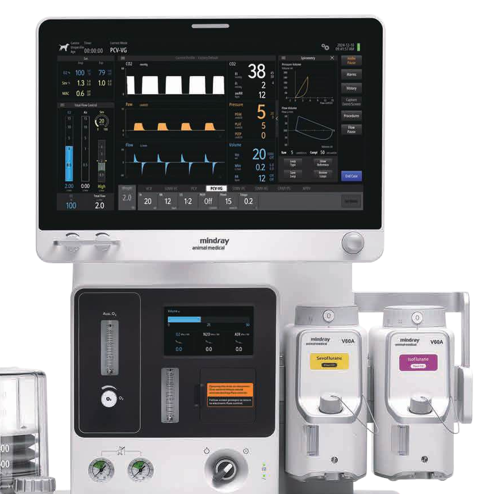 Main touchscreen with ventilation waveforms above the status screen, flowmeters, and two vaporizers on a Mindray WATO A7
